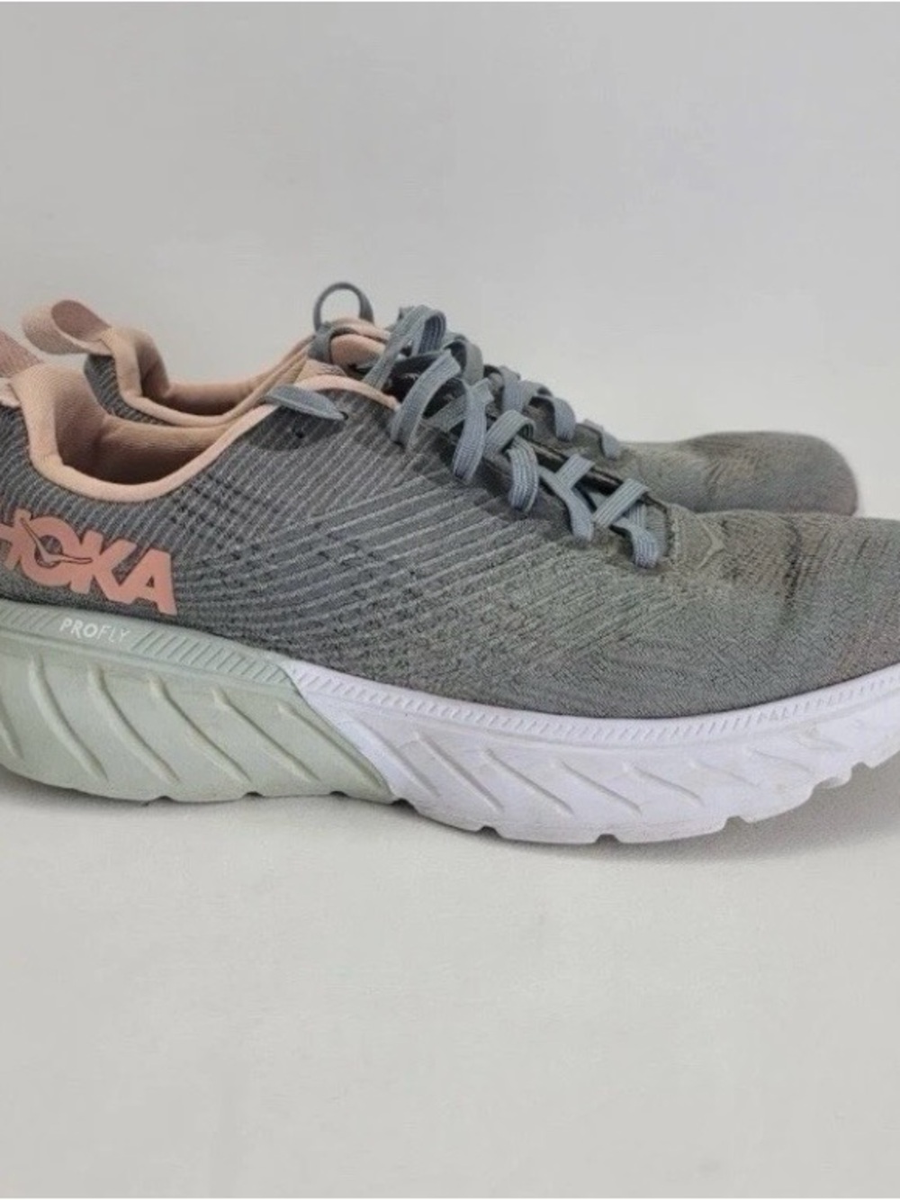 Hoka Women's Grey with peach Accent Running Shoes